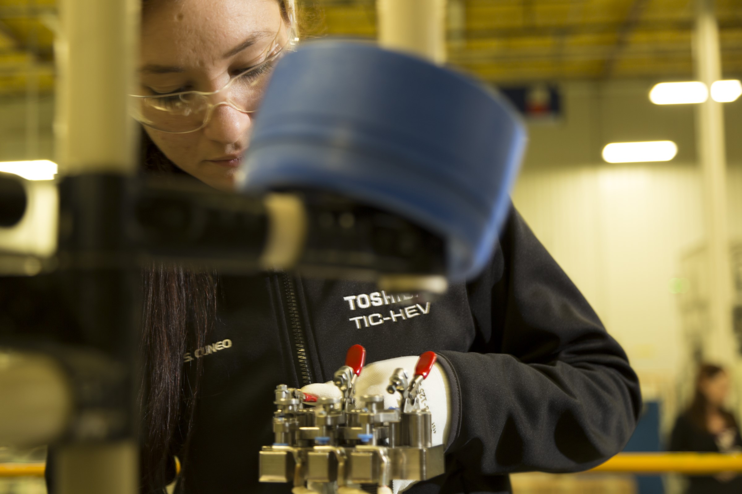 A female worker in an advanced manufacturing role